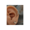 lotus earring on a ear